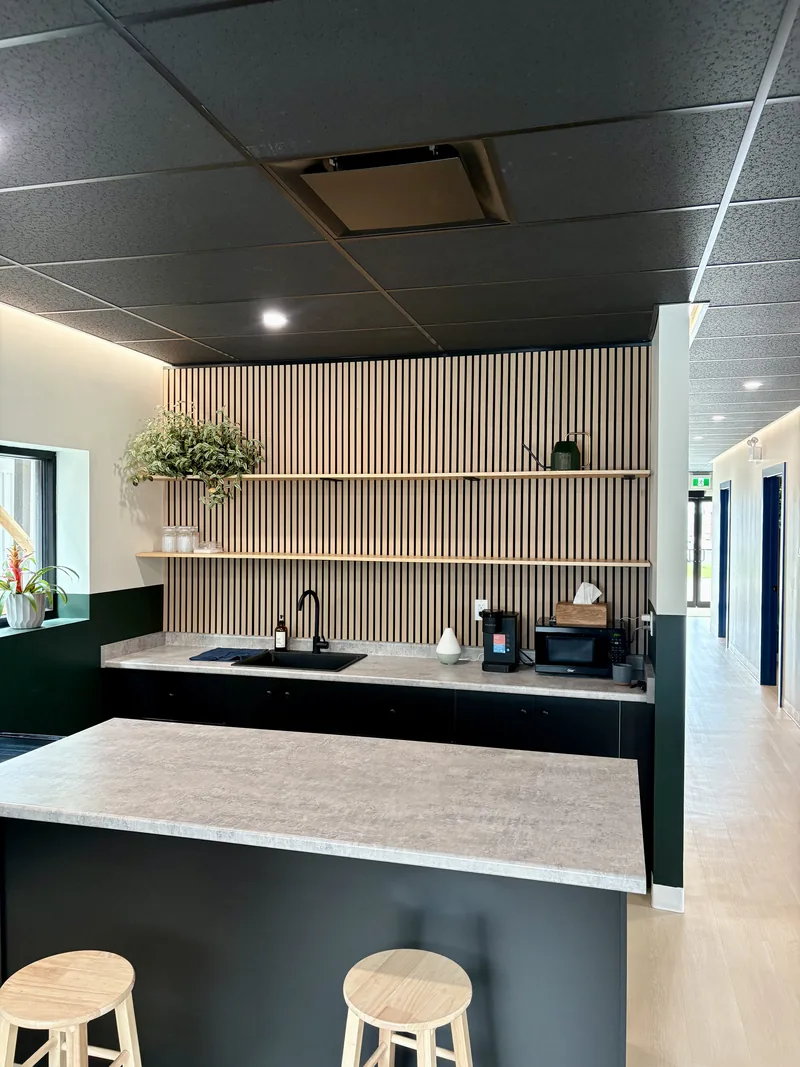 Coffee and water station for patients at Achieve Movement Health Clinic in Simcoe, Ontario