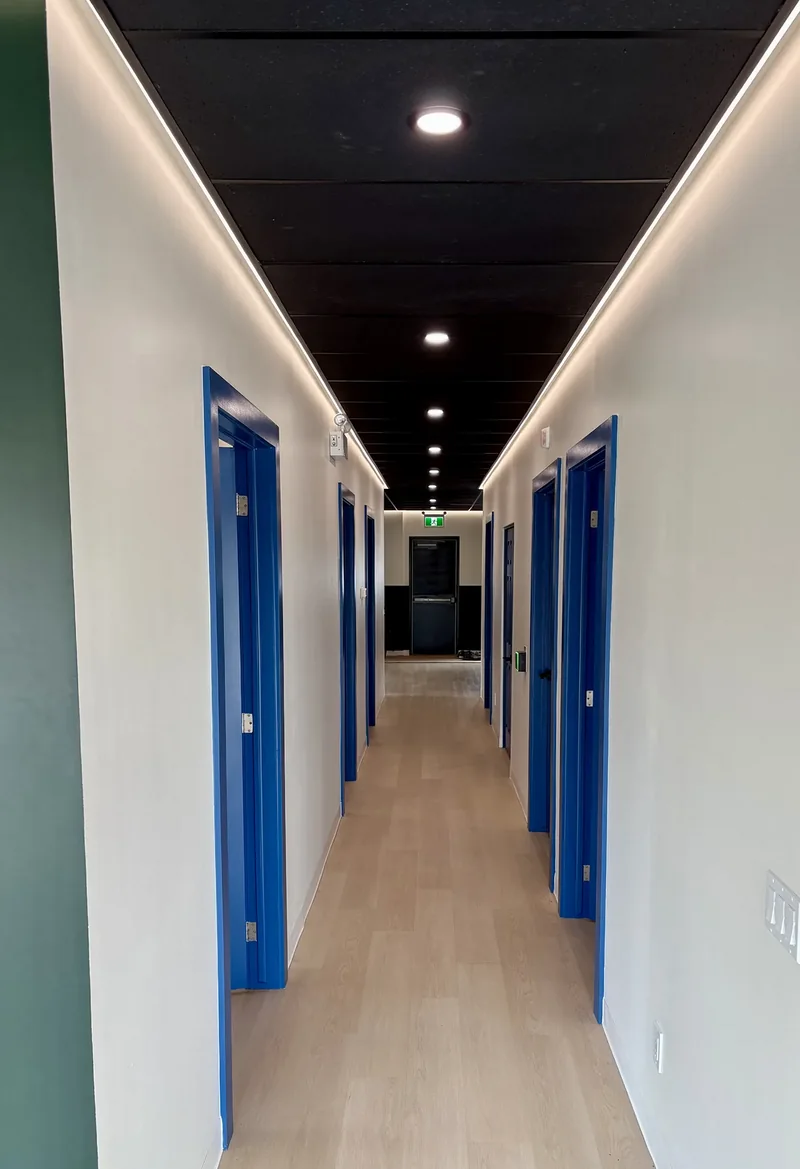 Hallway of private treatment rooms at Achieve Movement Health Clinic in Simcoe, Ontario