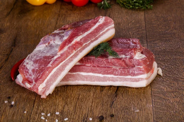 BARRIGADA DE CERDO PORCIONADA