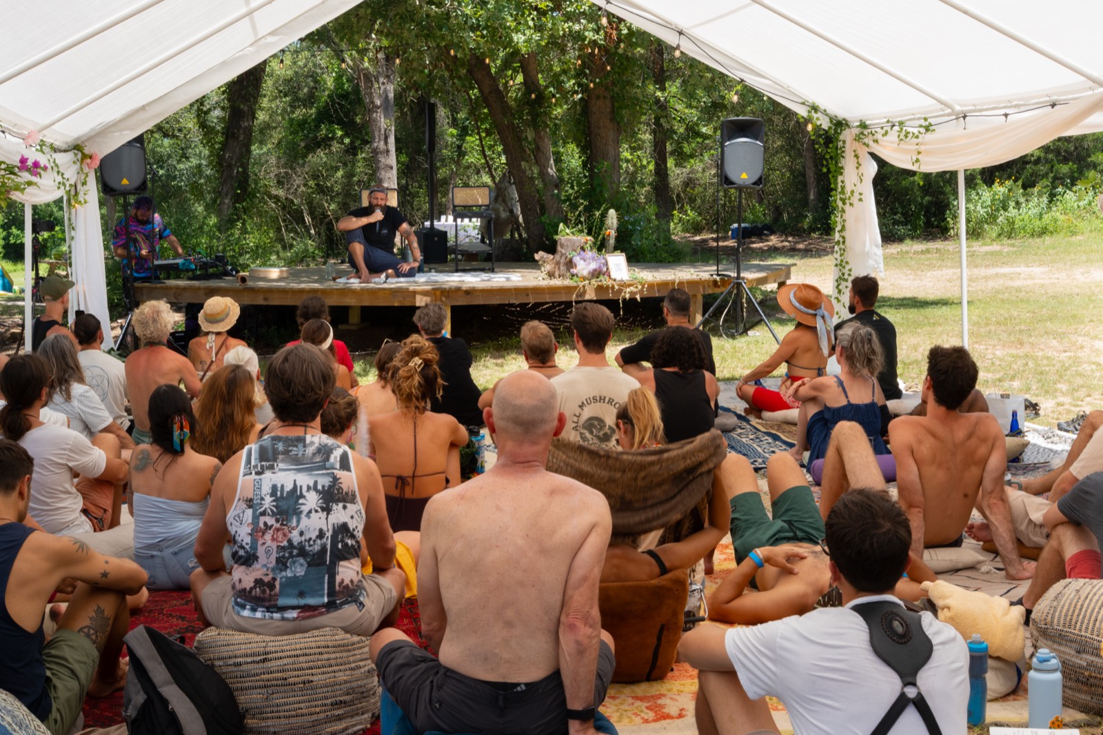 Community gathered under the tent at Haven