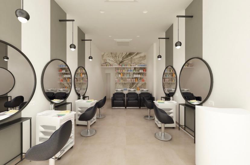 Salone di parrucchiere con specchiere rotonde, poltrone nere e pavimento in gres beige — locale commerciale a Roma