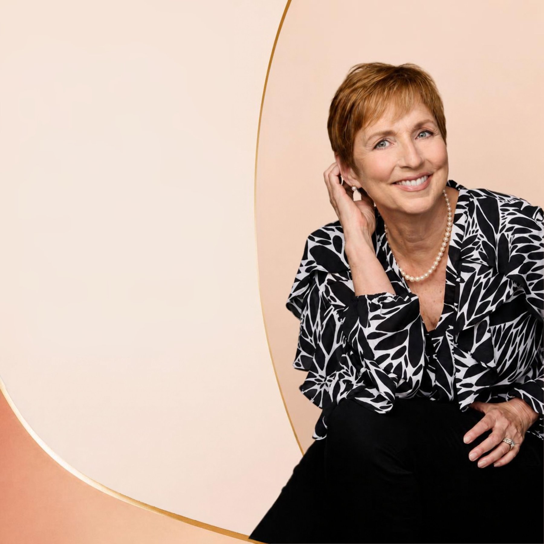 Laurette DeJulian in a black and white blouse and pearls