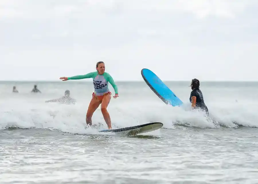 Catching a wave at a Nicaragua surf camp