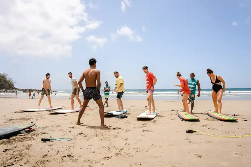 Group surf lesson on the beach
