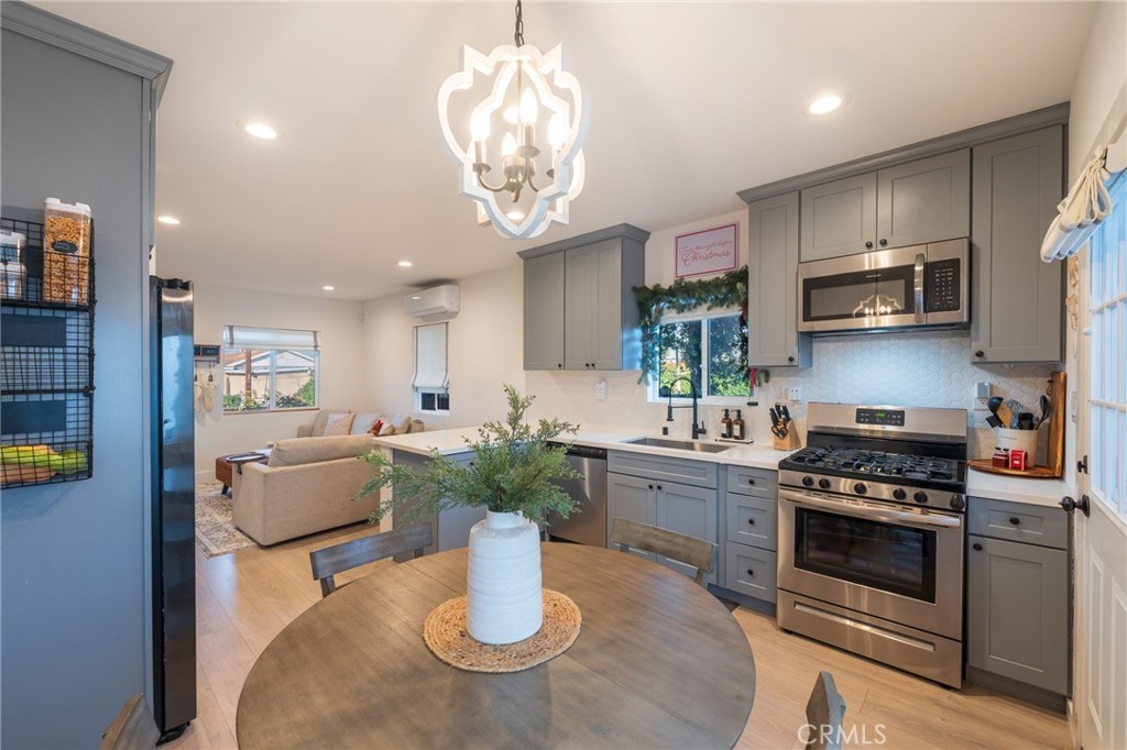 Dining area and kitchen prepared for listing photography