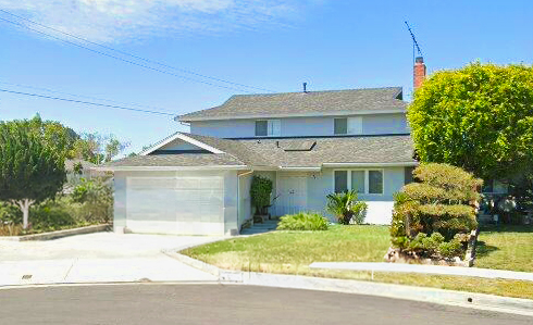 Single-story exterior and landscaped front