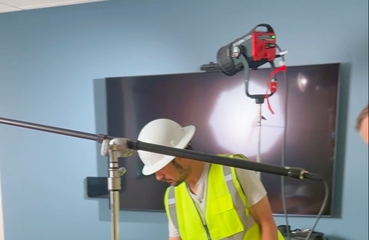 Crew member setting up lights