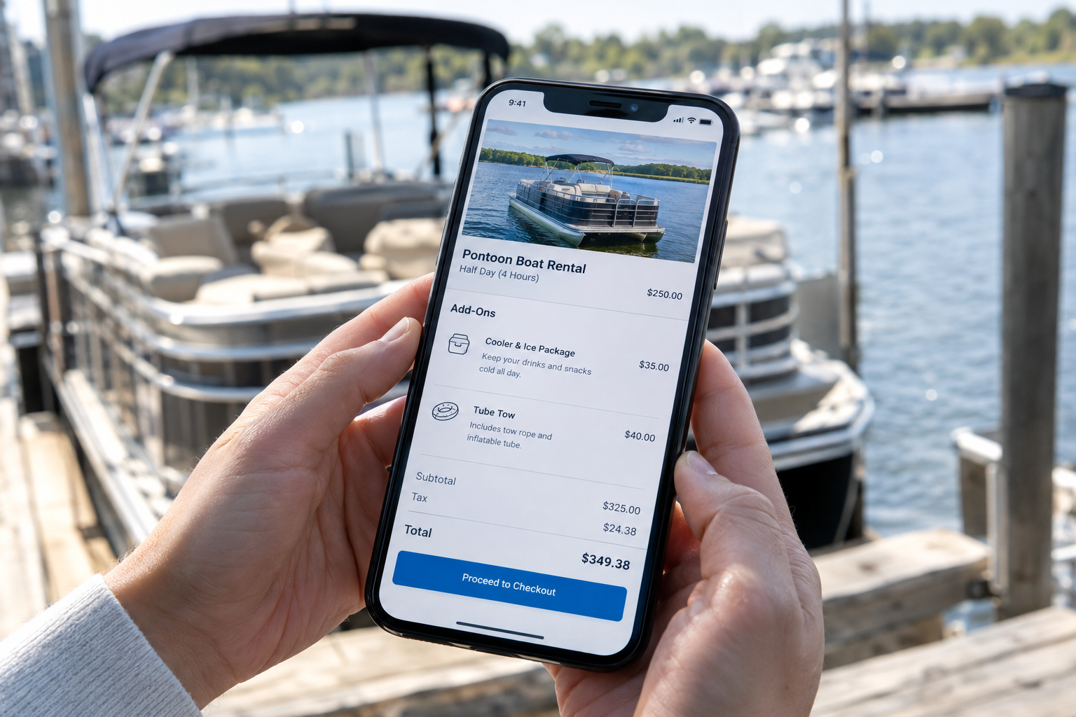 Customer viewing a mobile boat rental checkout screen showing add-on line items including cooler package and tube tow