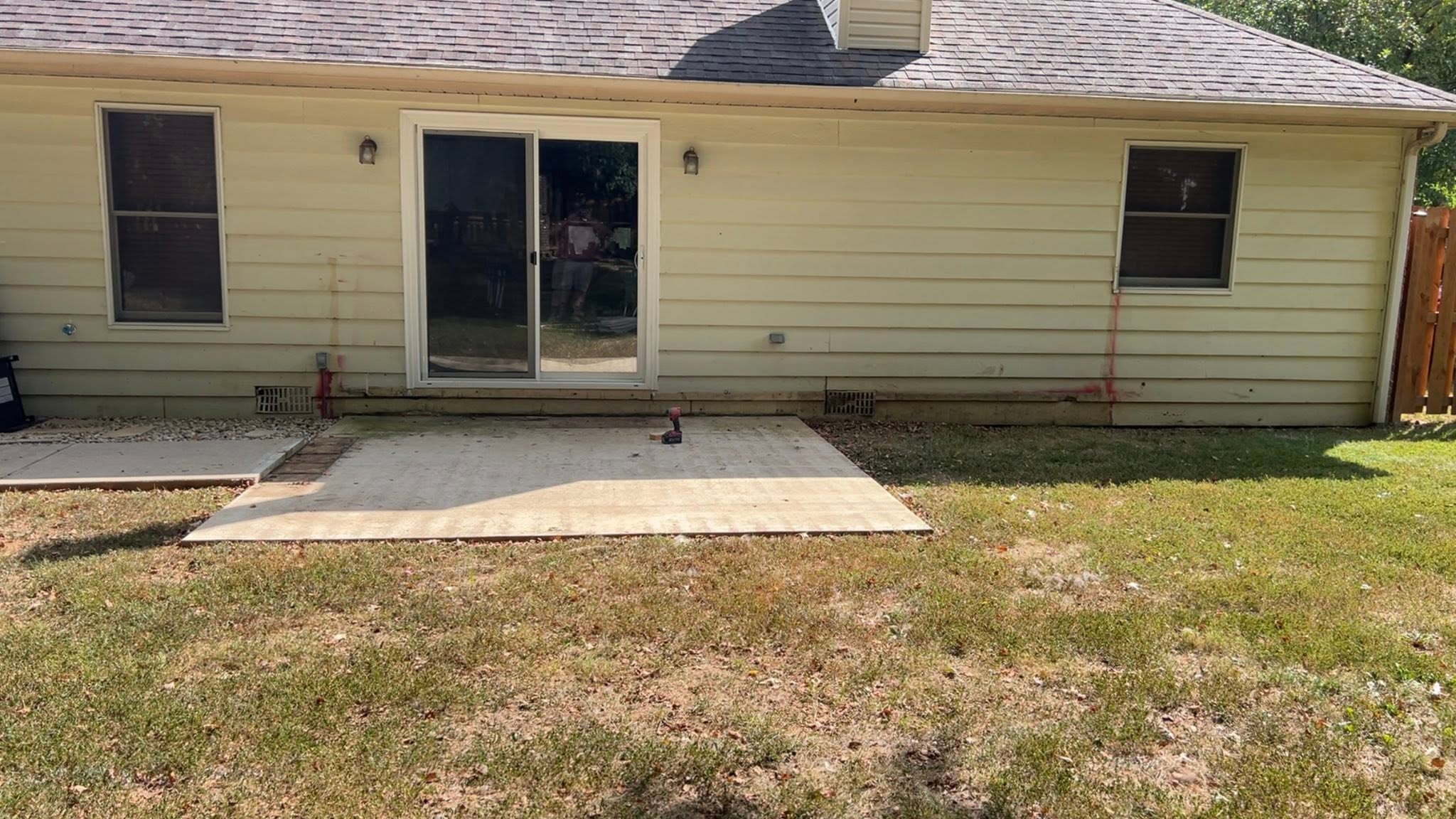 Old back porch before replacement by JW Concrete Construction