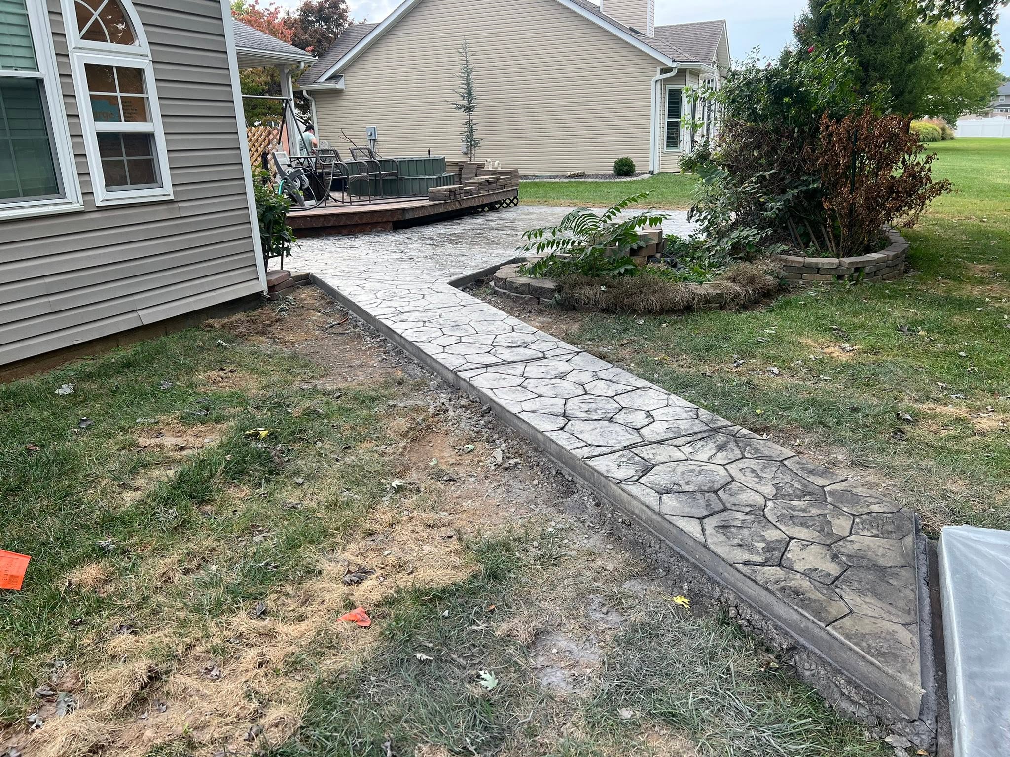 Stamped concrete installation — site prep and forms