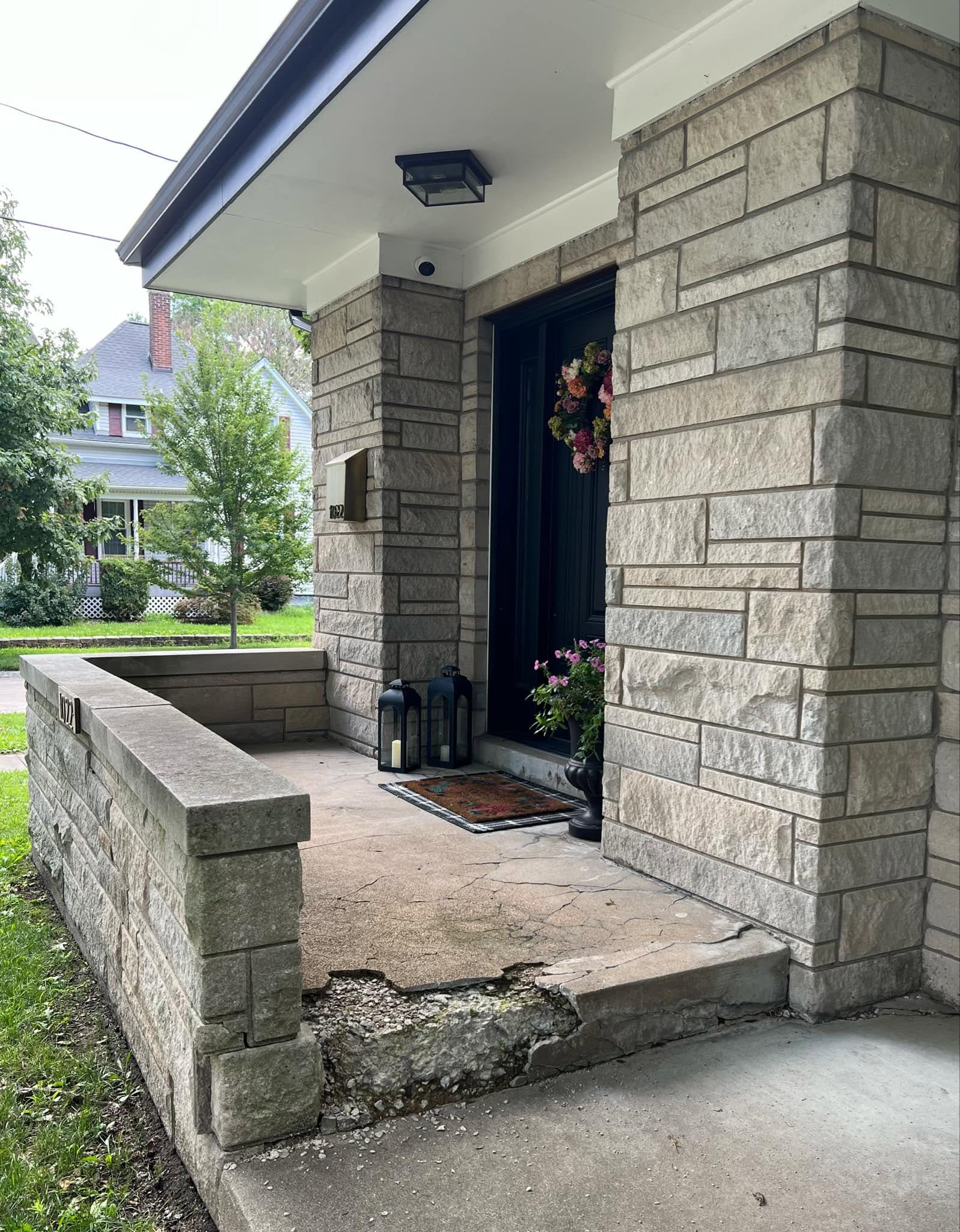 Old front porch and stairs before replacement by JW Concrete Construction