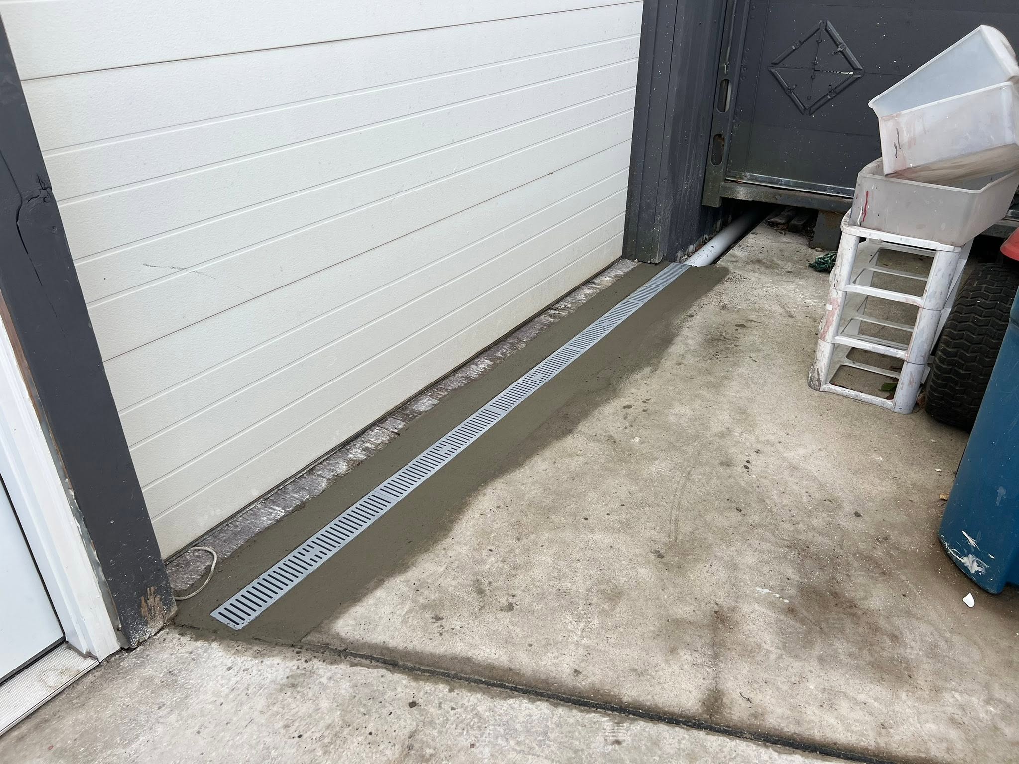 Concrete drain installation by JW Concrete Construction
