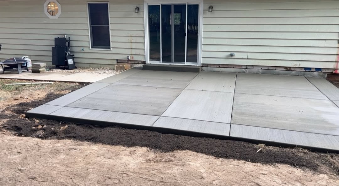 Newly poured back porch after replacement by JW Concrete Construction