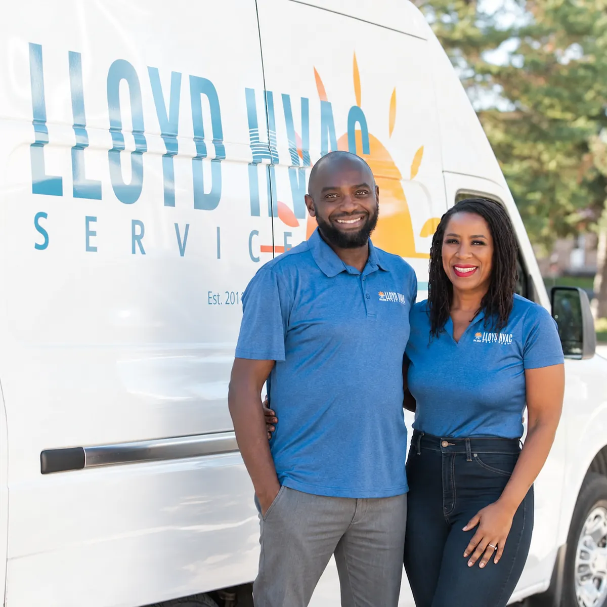 Lloyd and his partner in front of the Lloyd HVAC Services truck