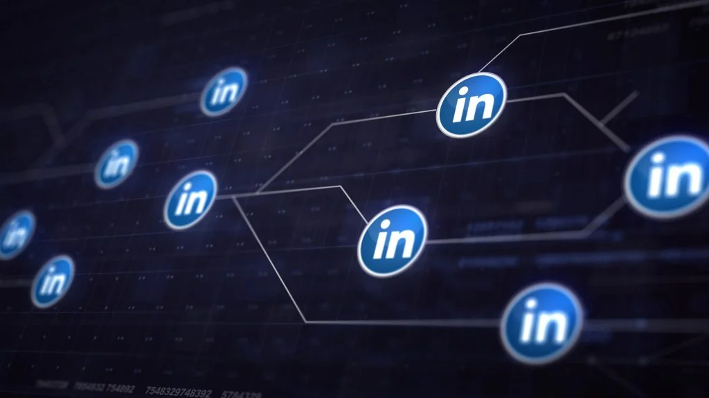 Blue LinkedIn logos connected by lines on a dark digital network background, highlighting how to pick the best social media platform for your professional connections, how to pick the best social media platform