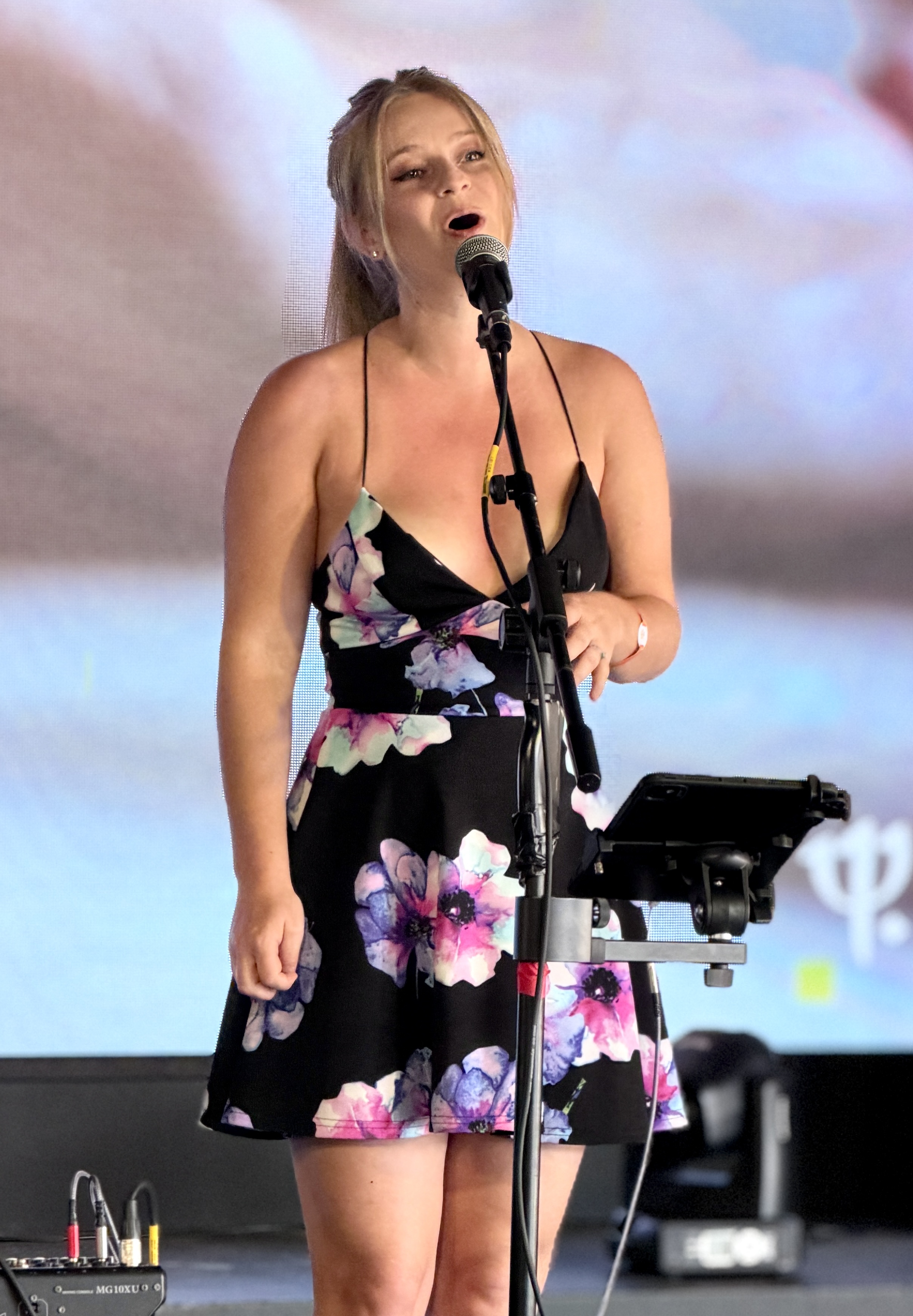 Lara Chapman singing, founder of VoxTape Studios