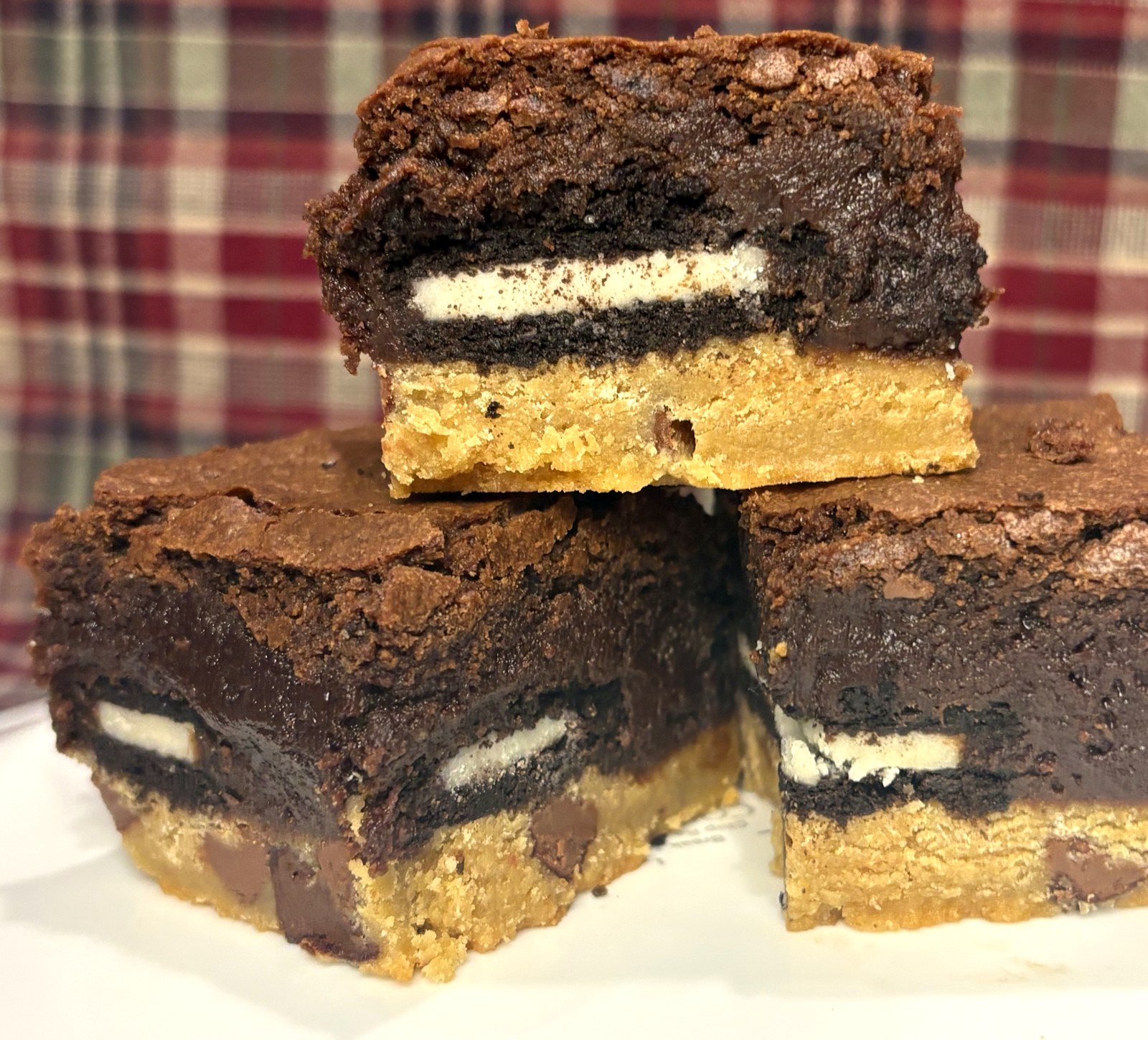 The Last Straw layered bar showing cookie, Oreo and brownie layers