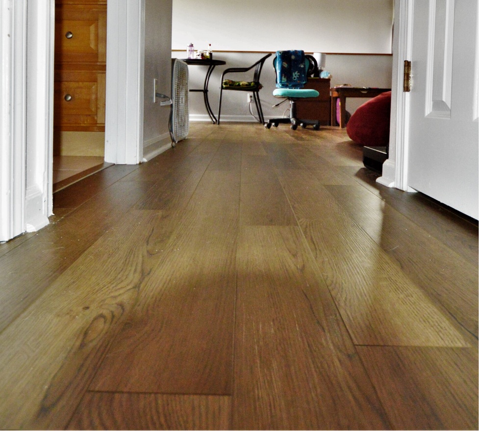A smooth, clean Luxury Vinyl Plank floor after deep cleaning