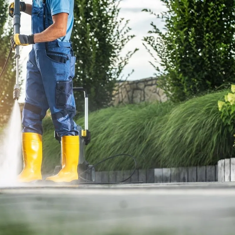 Power washing removing mold and algae from Nassau County NY home siding — Reyes Euroscape Design Corp.