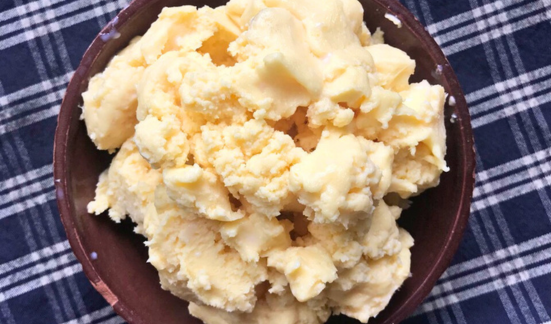 A redware bowl filled with fresh butter
