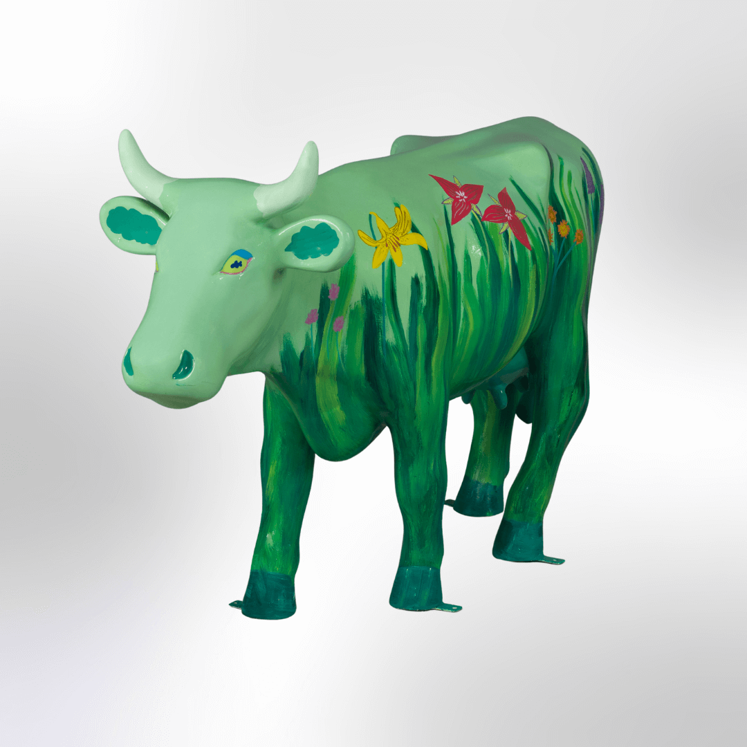A green cow with flowers