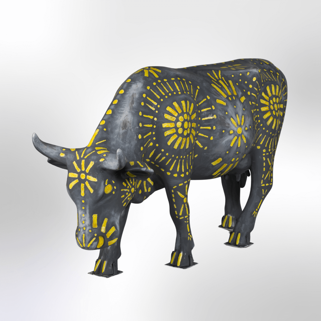 A cow painted to look like a punched tin lantern