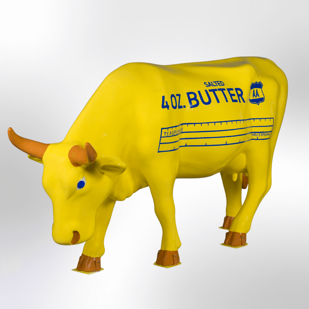 A yellow cow painted to look like a stick of butter