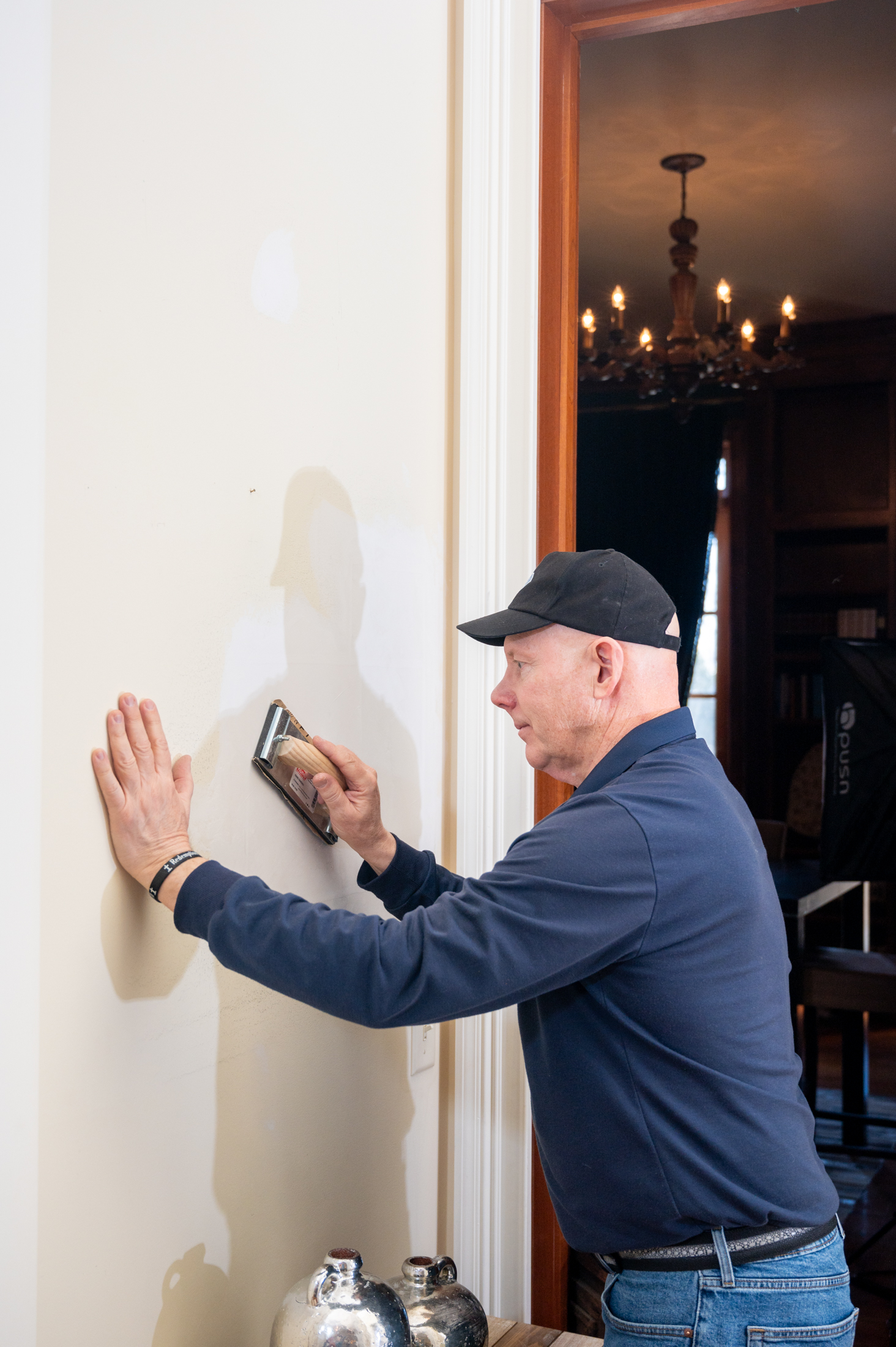 Mark Weir performing careful drywall repair in a Greenville SC home