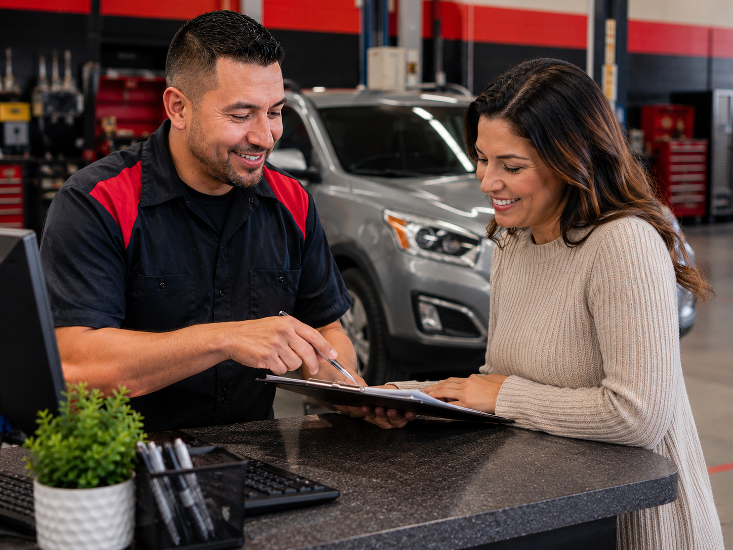 Transmission specialist explaining repair warranty coverage to customer in Palmdale California