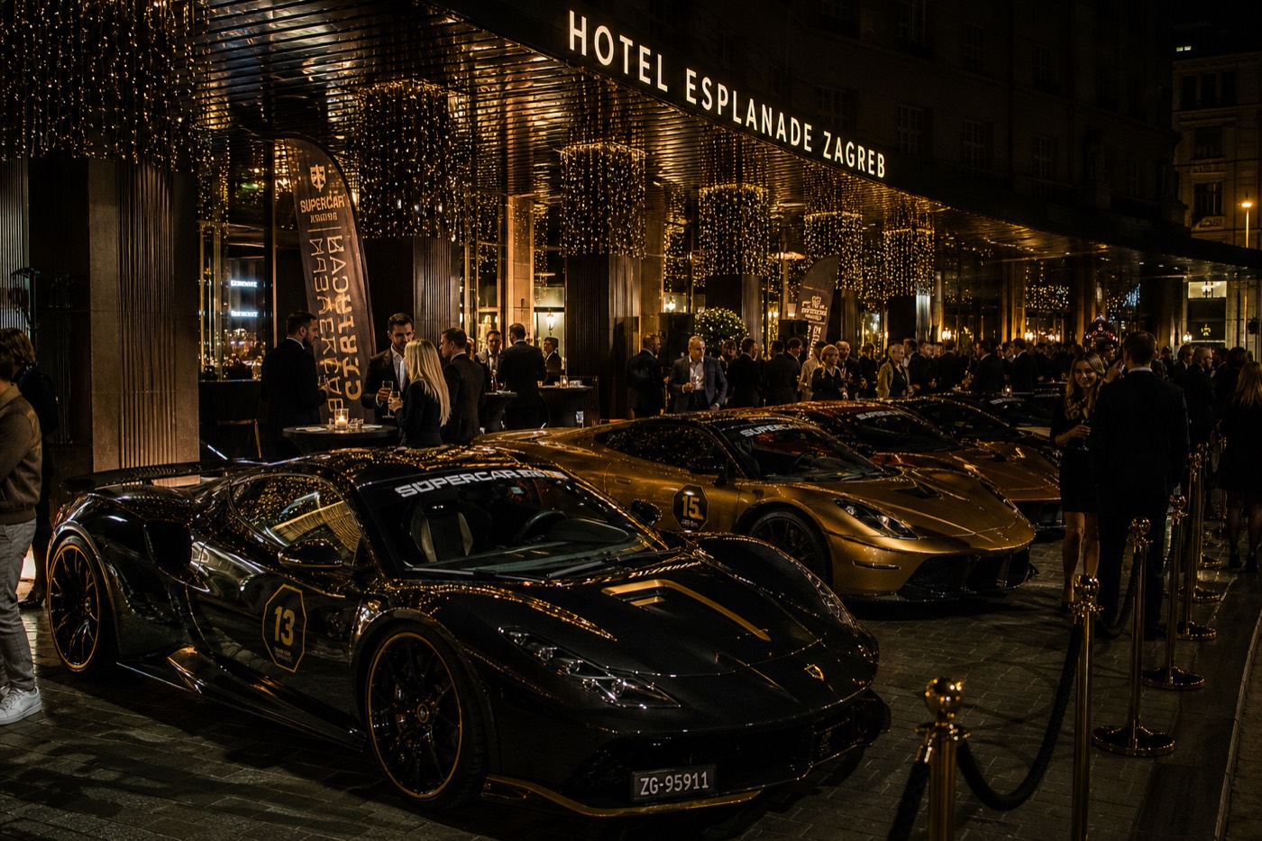 Opening party in Zagreb with supercars parked in front of the hotel and the crew mingling at night