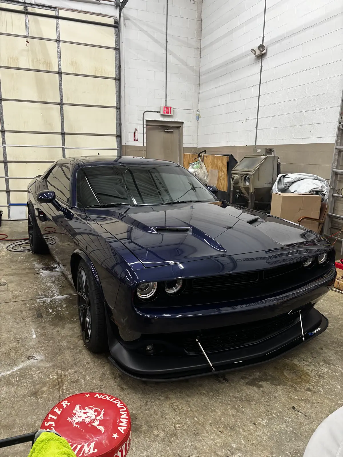 Dodge Challenger finished after paint correction in the bay