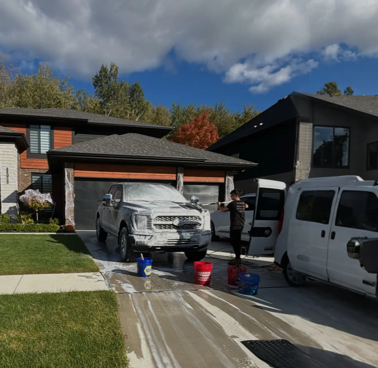 Mobile detailing setup running in a driveway
