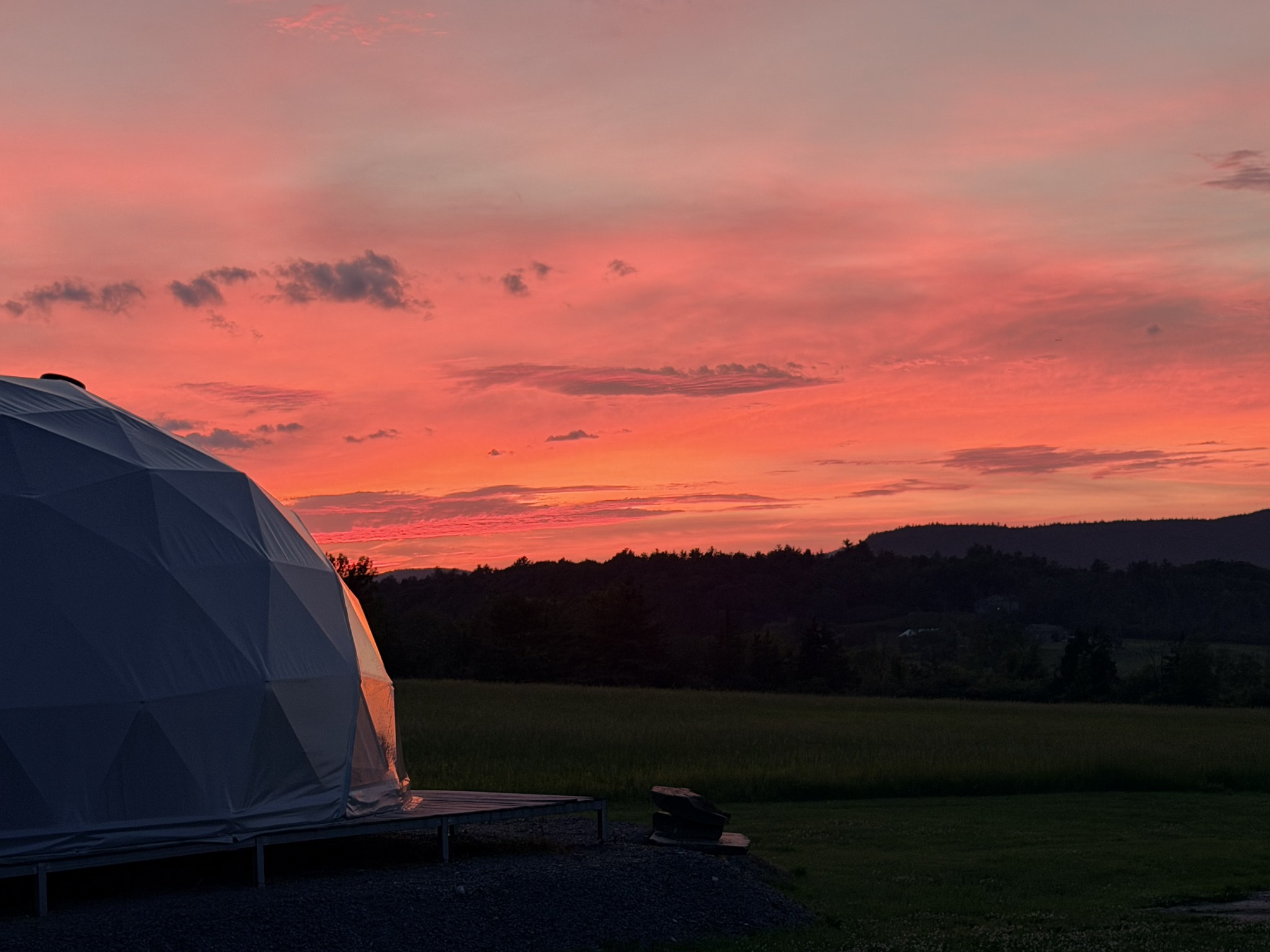 The Human Haven geodesic dome at sunset in the Adirondacks