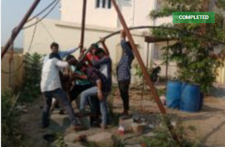 Villagers adding water pipe 