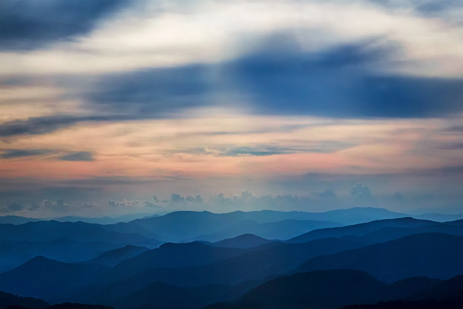 The Blue Ridge Parkway winding through fall-colored Appalachian mountains