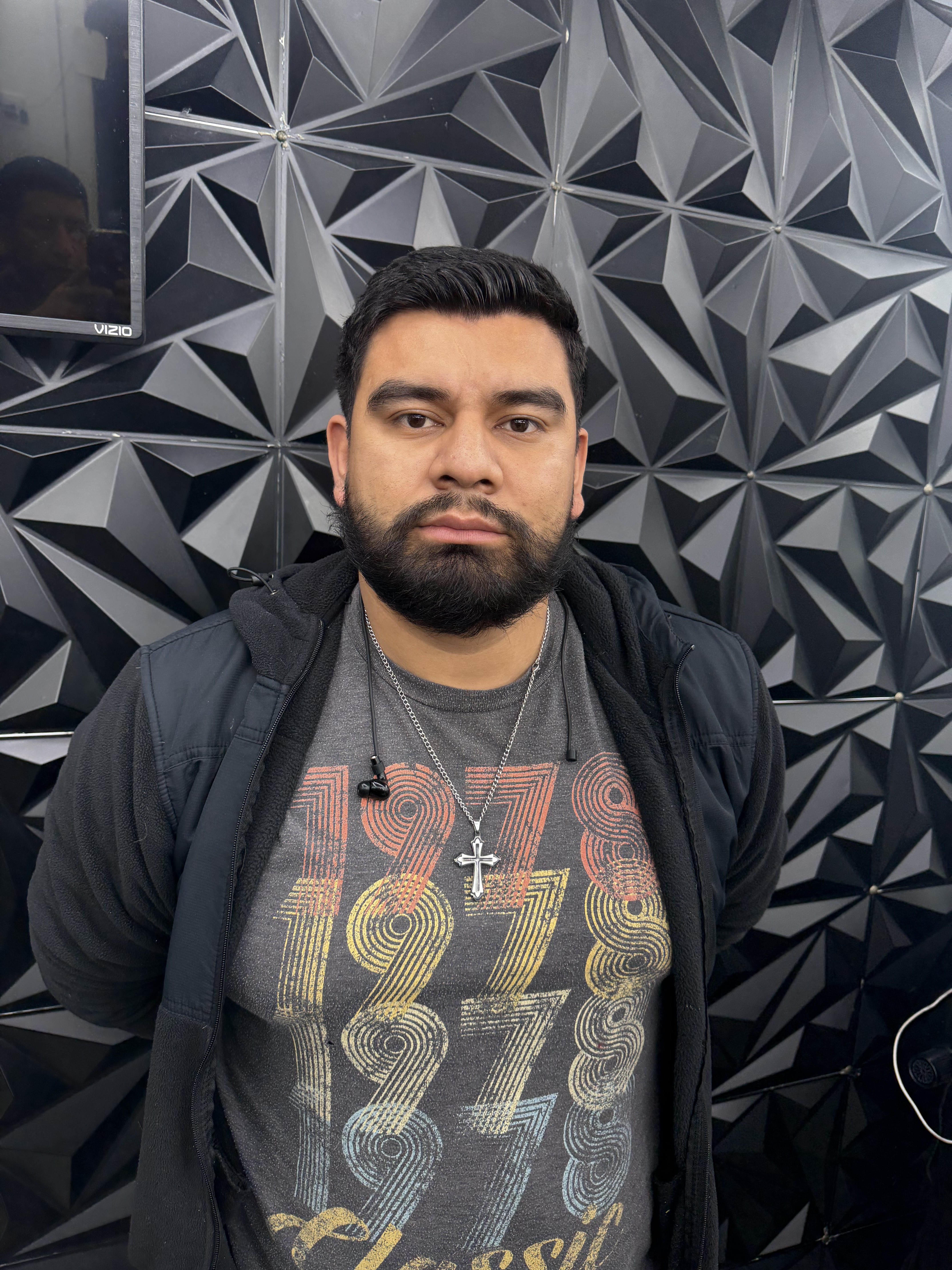 Alejandro, barber at ML Barber Shop