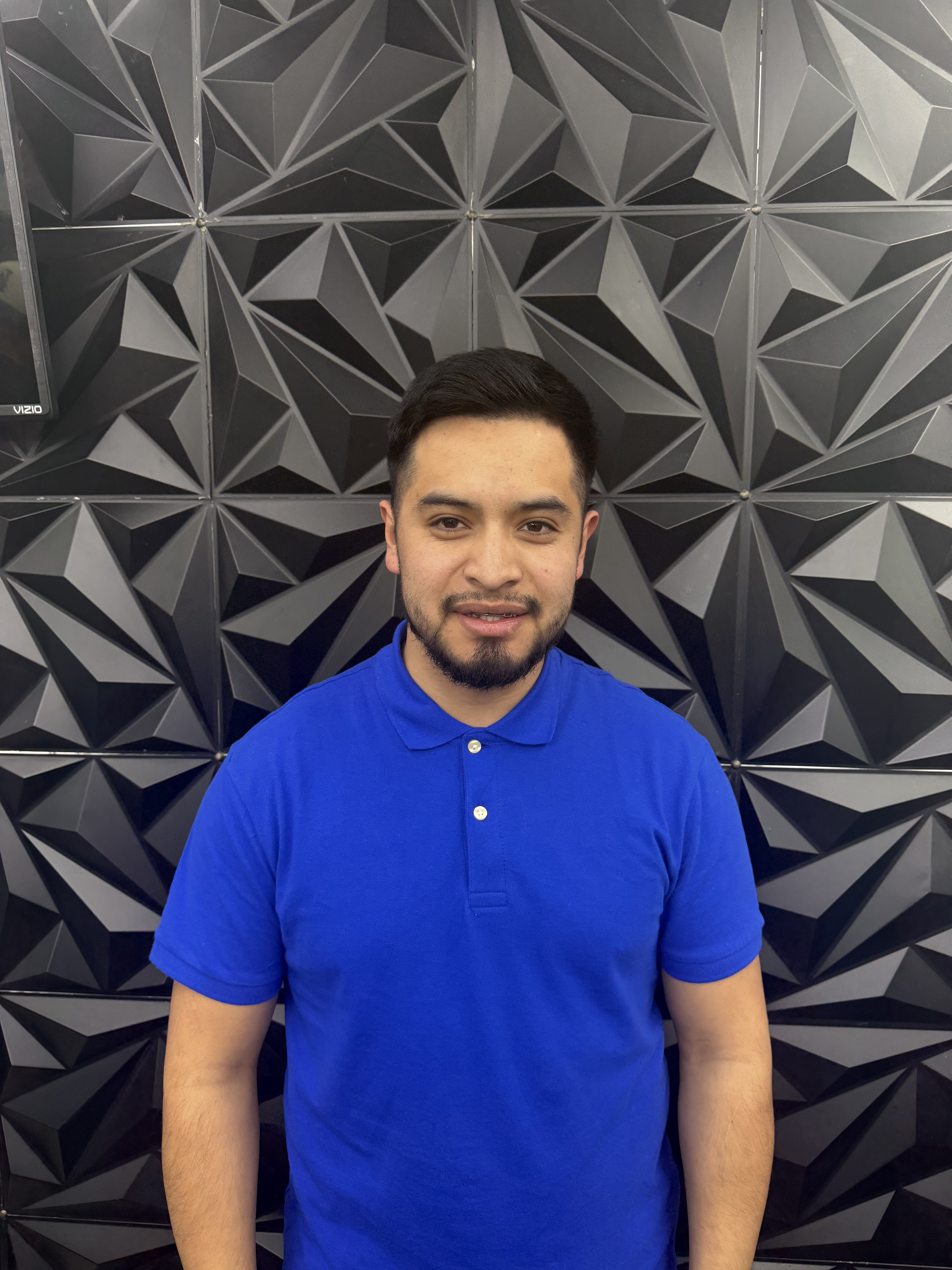 Matteo Toc, barber at ML Barber Shop