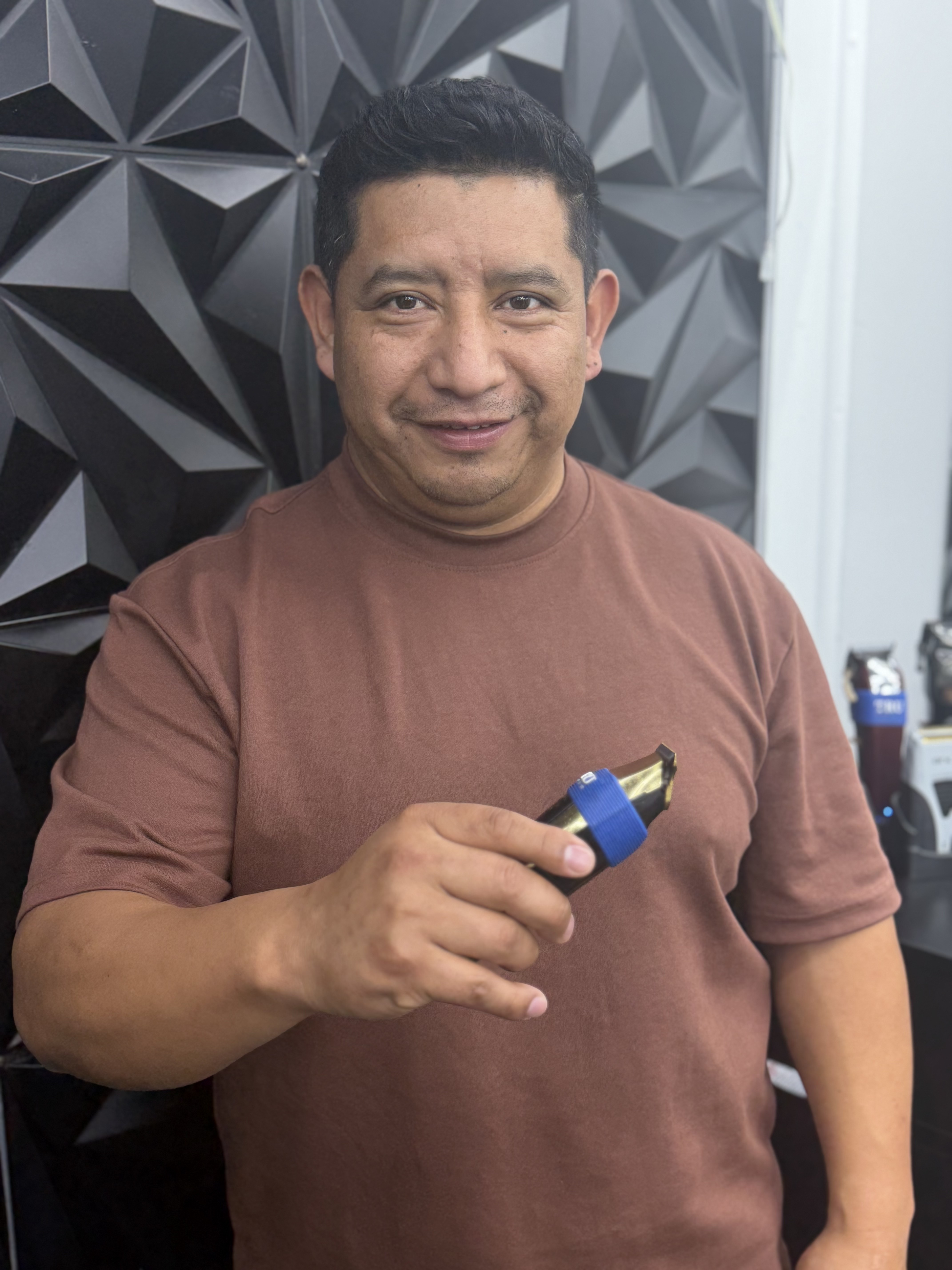 Santos Lopes, barber at ML Barber Shop