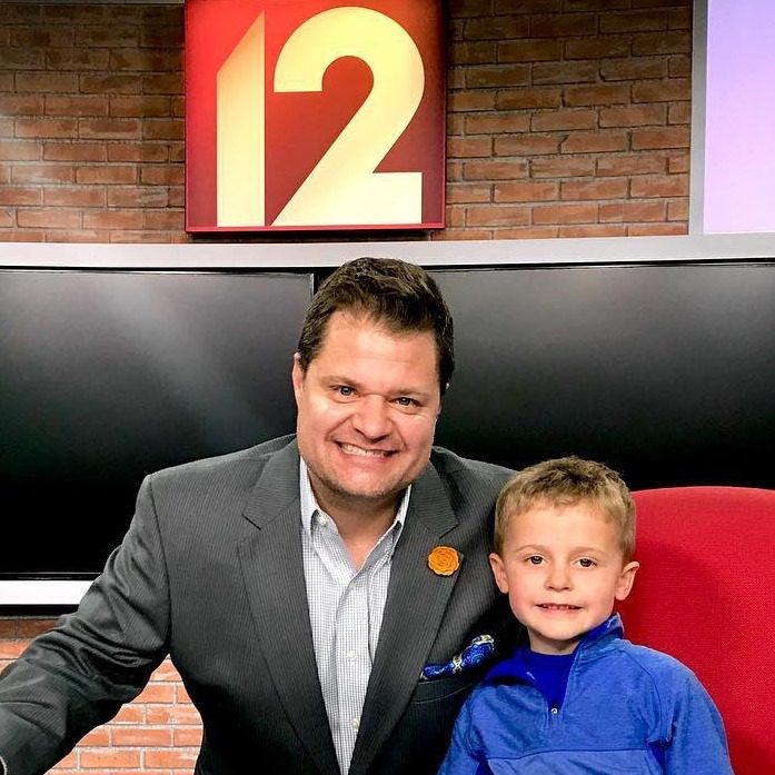 Storm Bennett and his son Harry at the CBS Local 12 WKRC news desk in Cincinnati Ohio