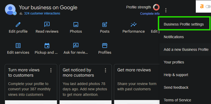 The menu open with Business Profile settings highlighted