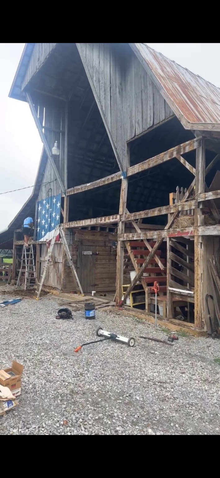 JT's Flag Barn — Replacement siding detail along the heritage barn exterior