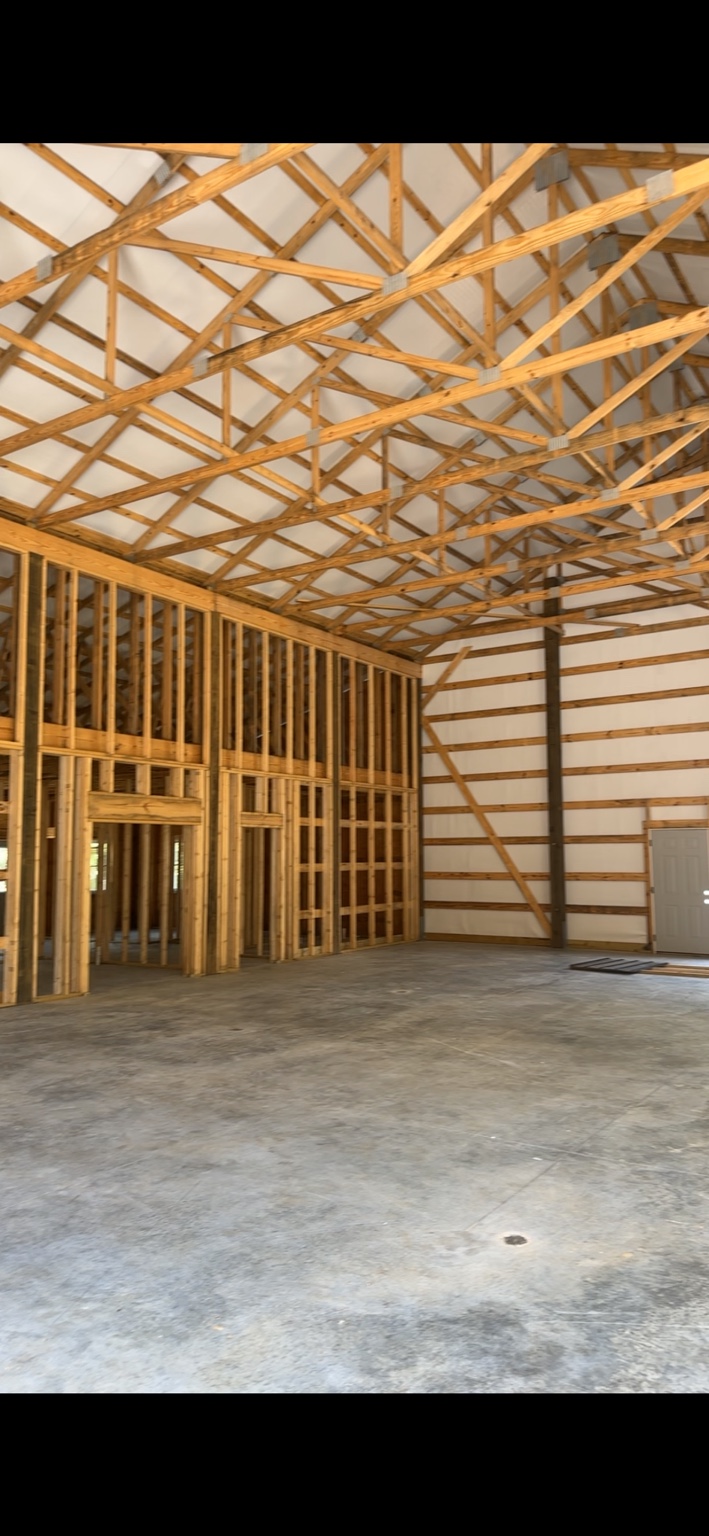 Duck River Honey Co. — Covered working space and large access openings along the building exterior
