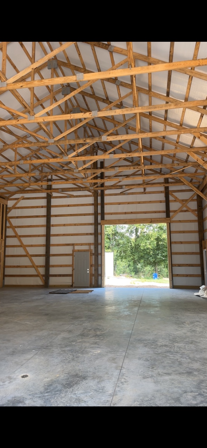 Duck River Honey Co. — Interior structural framing and truss detail of the metal building