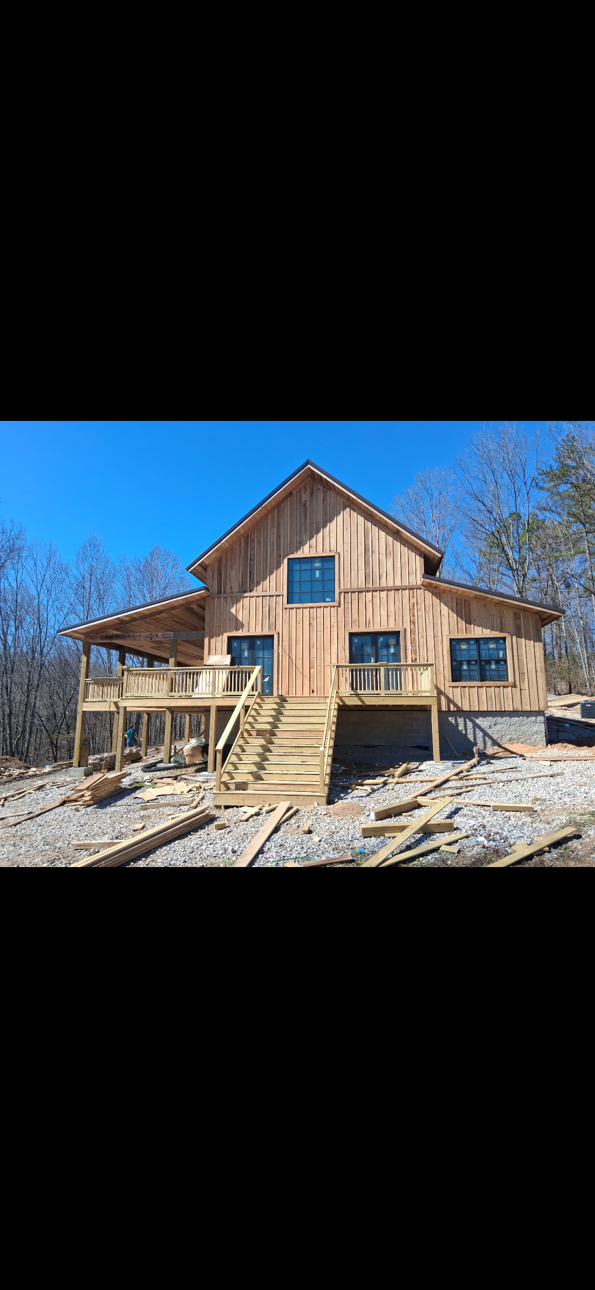 Rustic Custom Home — Completed exterior elevation of the Humphreys County custom home