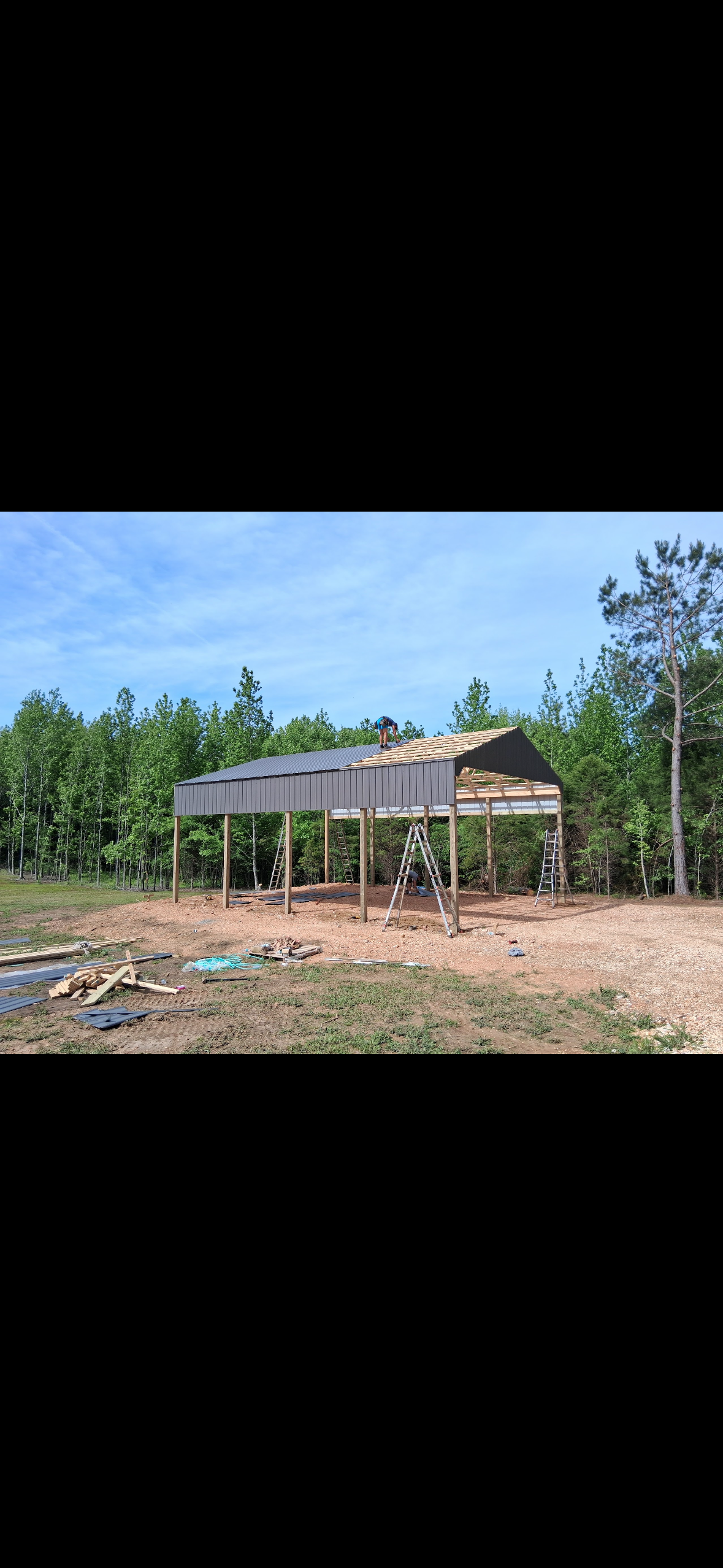 Open-Sided Pole Barn — Completed roof structure on the open-sided pole barn