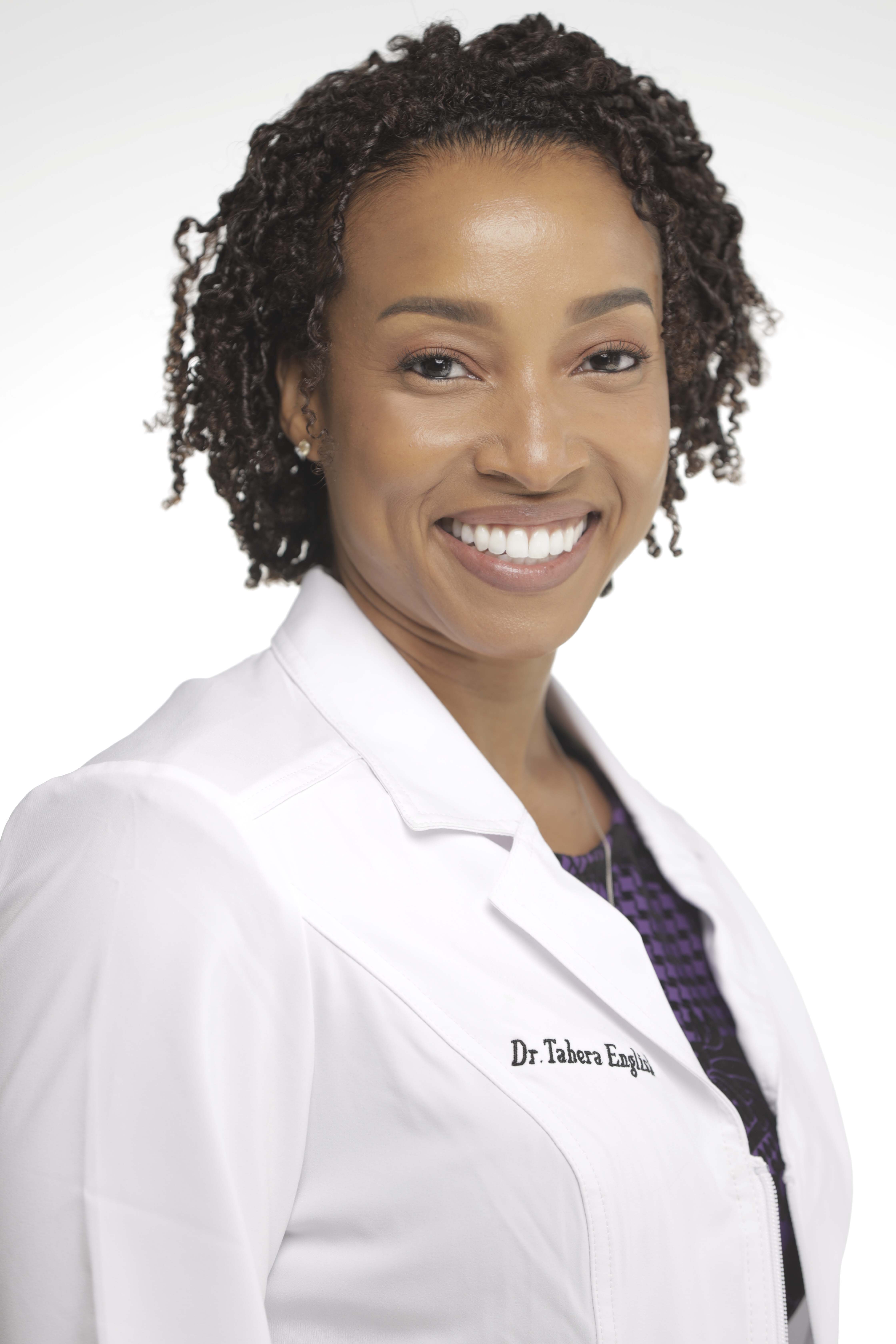 Dr. Tahera English, DNP, FNP-C in white coat