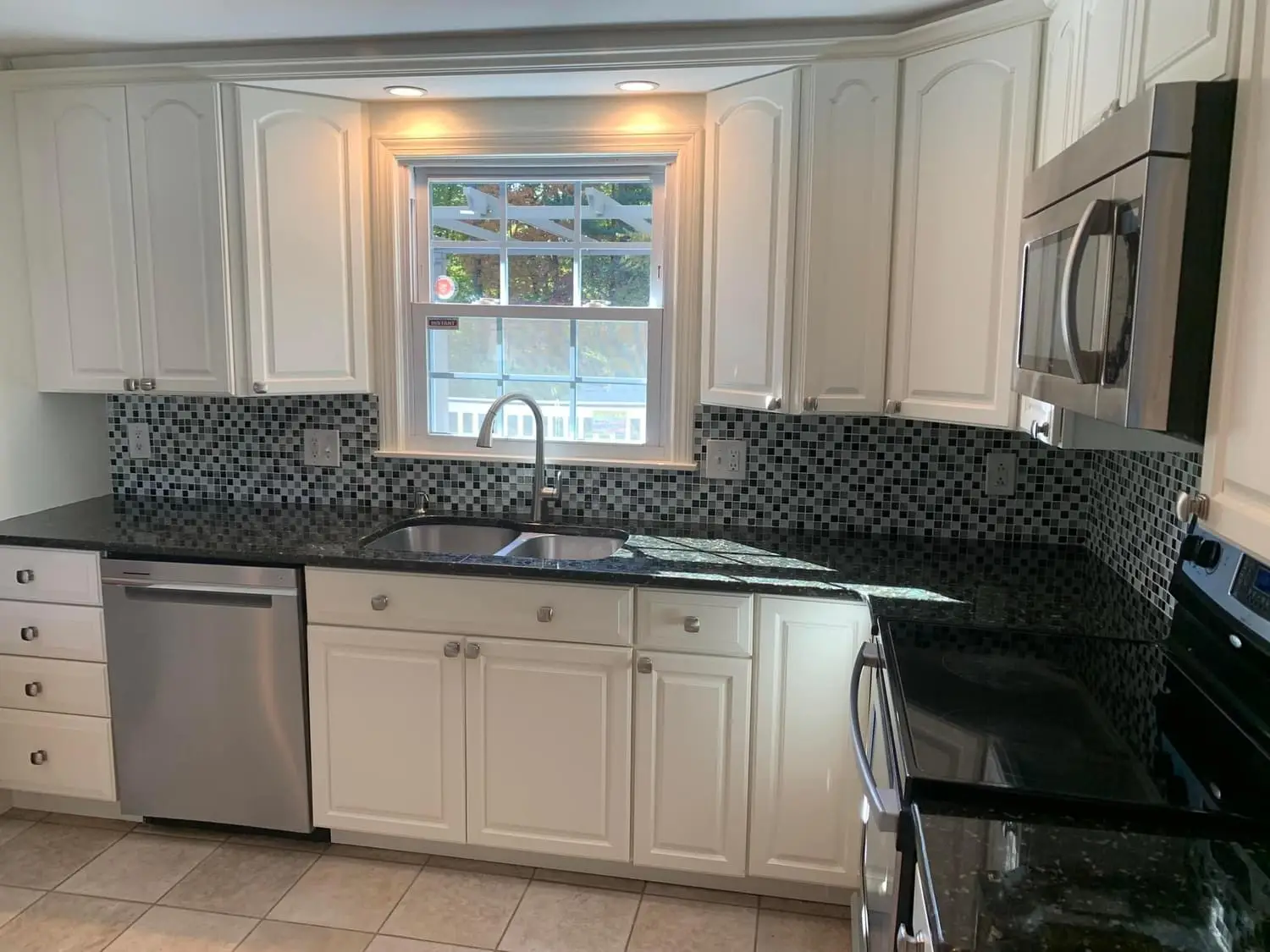 Kitchen cabinet painting project in Greater Boston by Seven Star Home Improvement (7)