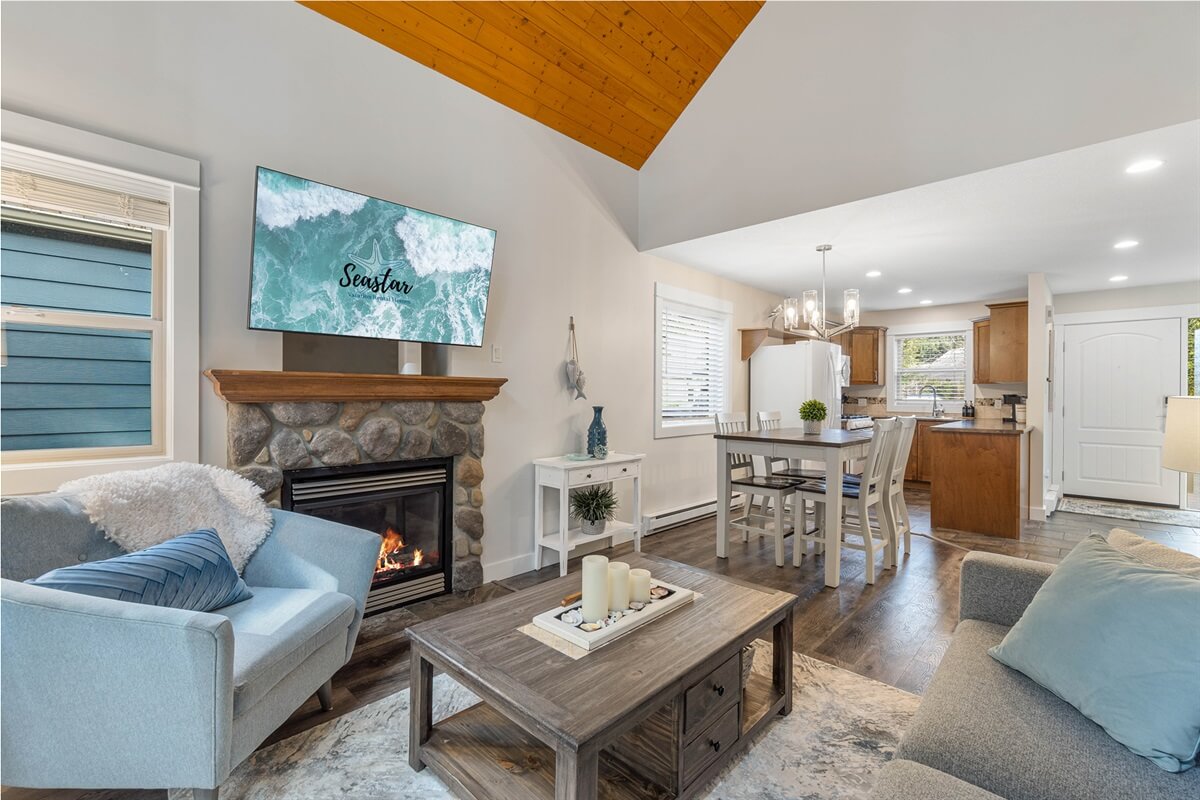 Sand Dollar — living room with stone fireplace