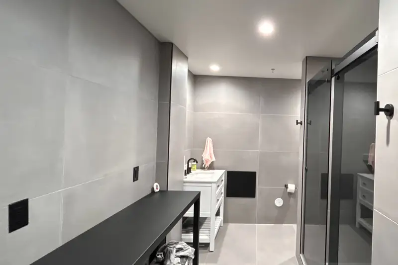 Owner-finished restroom inside a garage