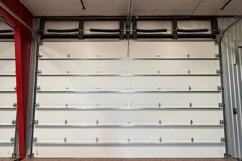 Insulated roll-up garage door from inside